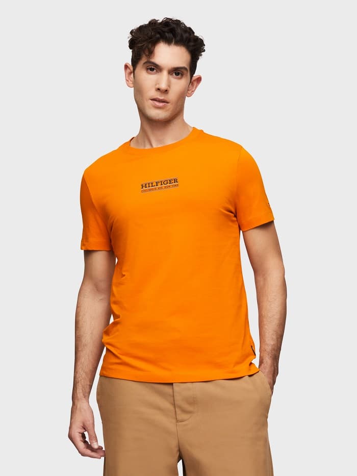 Man in orange Hilfiger logo tee
